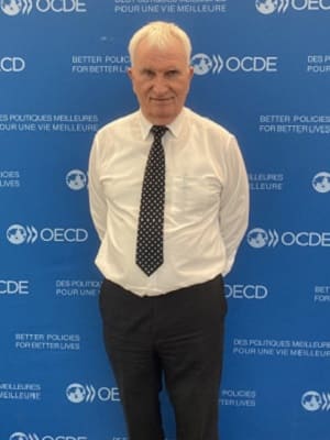 Dr Andrzej M Kotas attending OECD Steel Committee proceedings, Paris, November 2025