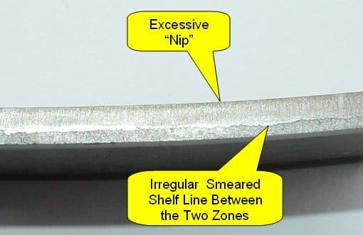 Trimmed strip edge showing excessive nick and irregular smeared shelf line from insufficient knife gap