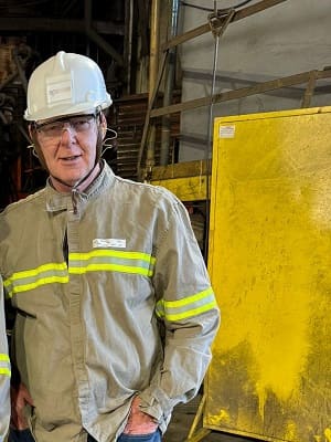 Steel industry consultant conducting on-site assessment at South American flat steel producer during multilateral development bank assignment