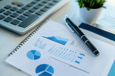 Financial analyst working on steel company business model and cash flow forecasts
