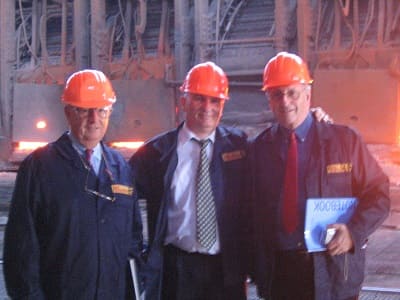Consulting team at steel plant conducting due diligence for international banking consortium investment