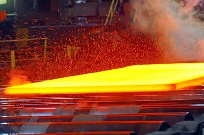 Steel mill production facilities with molten steel pouring operations
