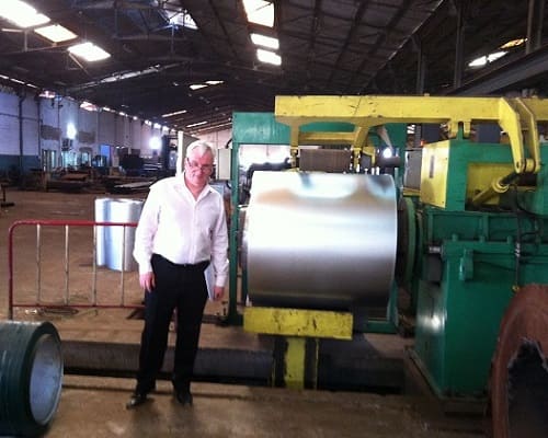 Dr Andrzej M Kotas at a West African steel processing plant, 2013